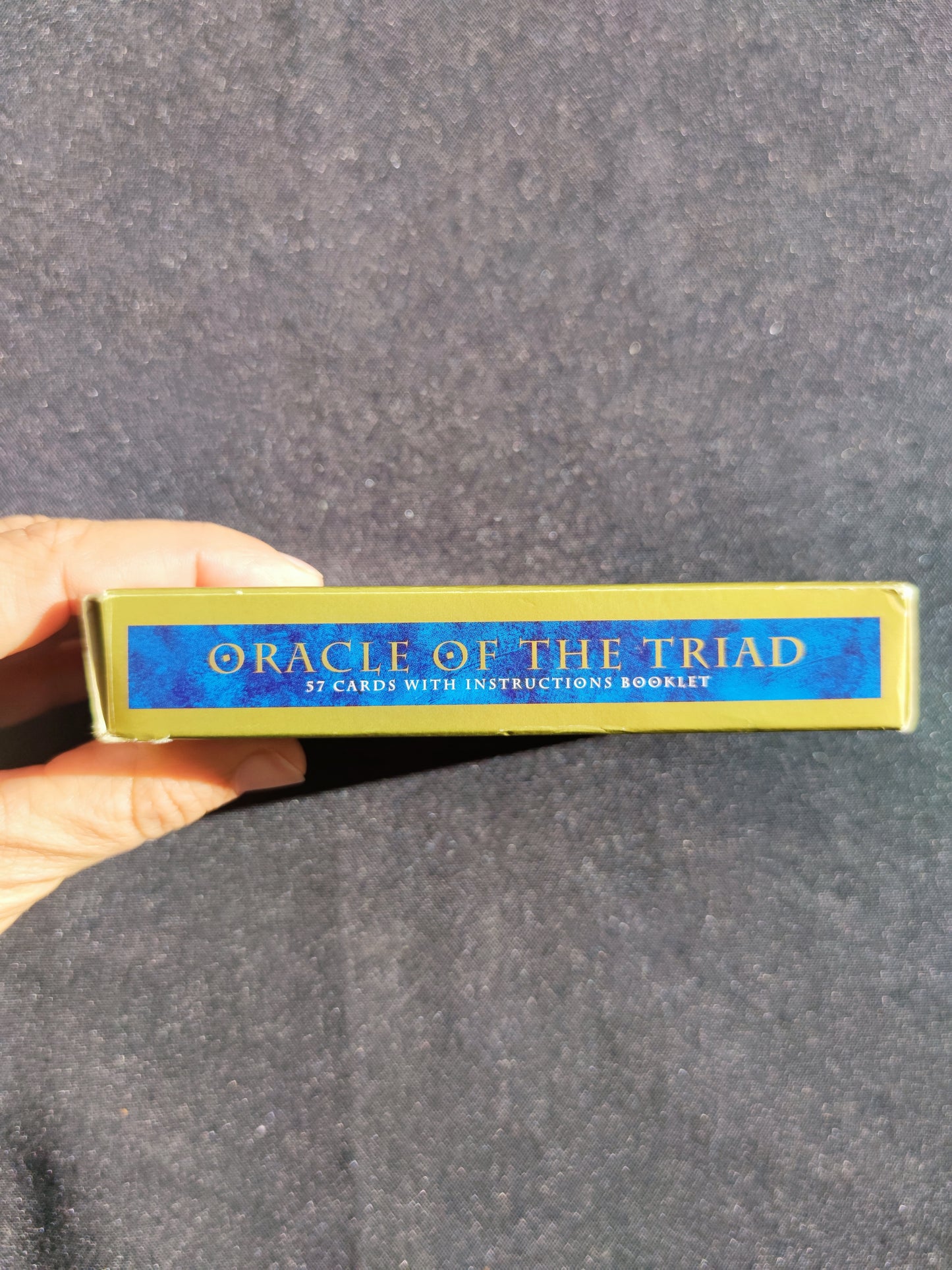 Cet Oracle a été créé par Dominique Duplaa "Éditions du Gange."
Ce jeu divinatoire n'est plus édité dans ce format.L’Oracle de la Triade est un jeu s’inspirant de la symbolique de philosophies et religions diverses : christianisme, judaïsme, astrologie, numérologie, alchimie, franc-maçonnerie, mythologies, kabbale, et aussi l’antiquité, l’Égypte ancienne, les traités de magie, la psychologie etc. Selon, l’auteur, ce jeu permet de cerner les problèmes matériels propres à notre dimension terrestre.
